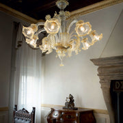 Luxurious Rialto chandelier with 8 lights in hand-blown amber glass, elegant decor enhancement.