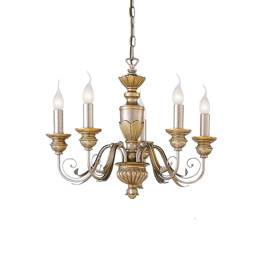 Gold metal chandelier with five lights on a height-adjustable chain, featuring handcrafted arms and leaf accents, dimmable lighting.