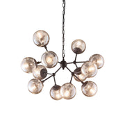 Ideallux KEPLER 12-light pendant lamp with matte black metal frame and amber glass diffusers, adjustable height, dimmable, 75cm diameter.
