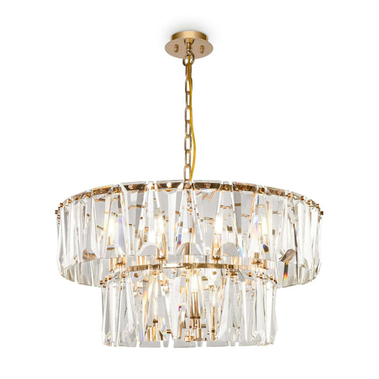 Maytoni PUNTES pendant light with sparkling crystal elements in gold finish, adjustable height, featuring 12 LED sockets, elegant design.