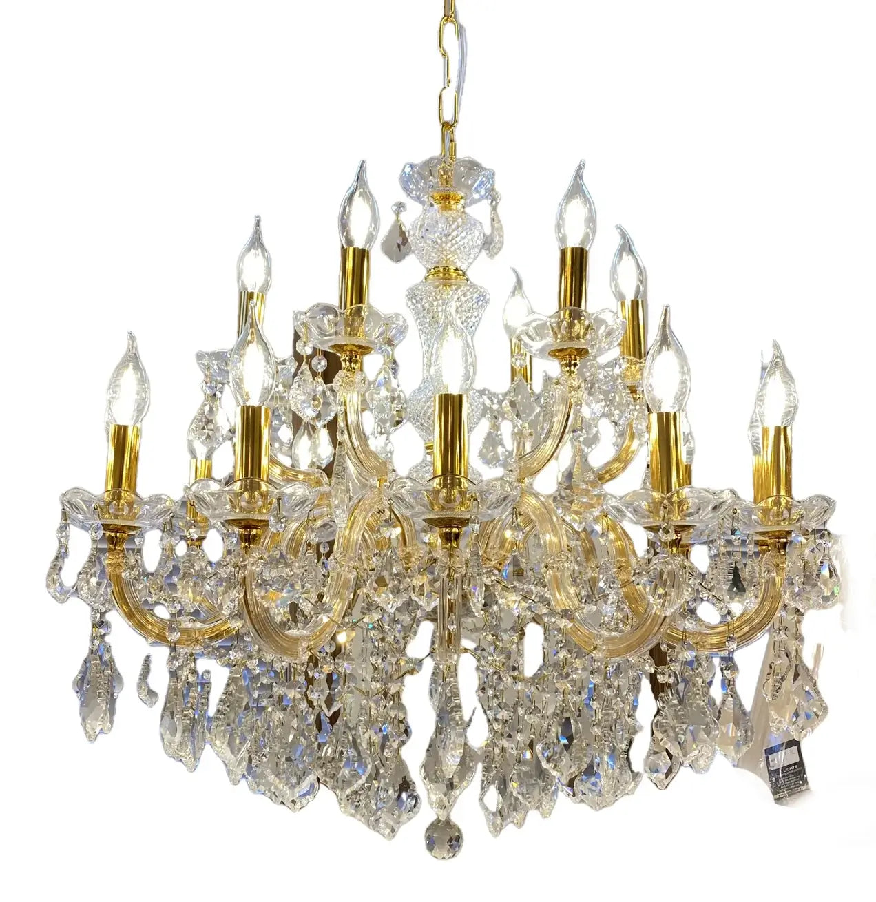 Luxurious Maria Theresia gold crystal chandelier with 18 lights, featuring sparkling cut glass and lead crystals, Ø77cm.