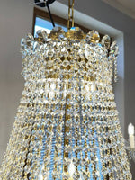 Elegant crystal chandelier with gold accents, featuring intricate glass and crystal design, suitable for staircases, 90cm diameter.