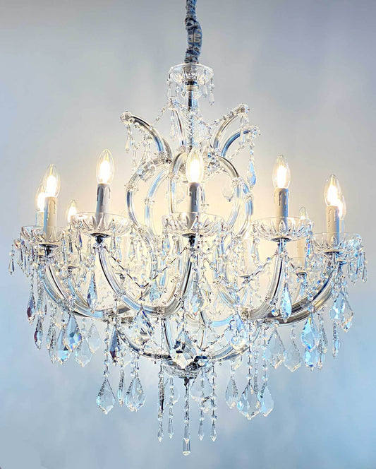 Luxurious Kristall Kronleuchter Mozart chandelier with 12 lights and crystal glass arms, ideal for elegant interior decoration.