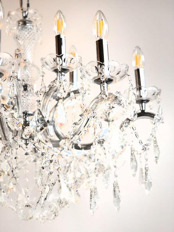 Luxurious crystal chandelier with 12 lights, silver finish, glass-encased arms, dimmable, Maria Theresia design, elegant home decor.