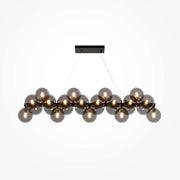 Maytoni Pendelleuchte Dallas Schwarz with smokey grey glass spheres, adjustable height, dimmable, featuring 25 G9 sockets.