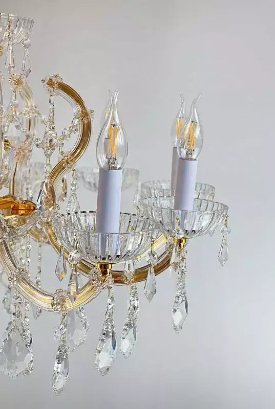 Kristall Kronleuchter SERENADE in Gold, Ø72cm, mit Kristallglas ummantelten Armen und E14 Leuchten, elegantes Design. Dimmbar.