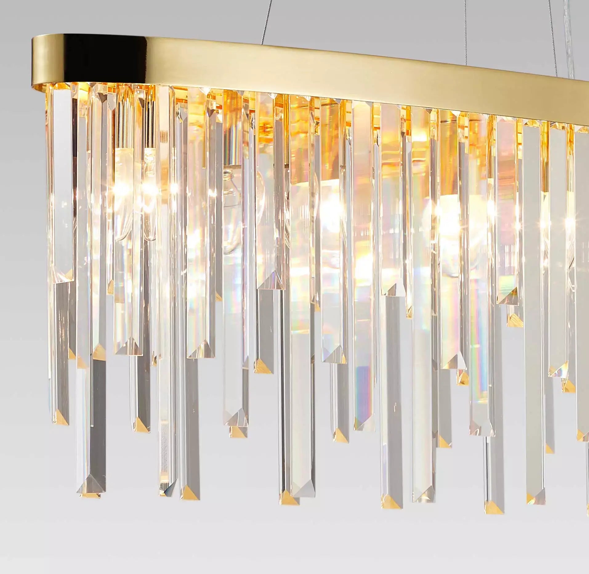 Gold Starnberg pendant light with sparkling crystal rods, 90cm, dimmable, ideal for elegant home decor lighting.