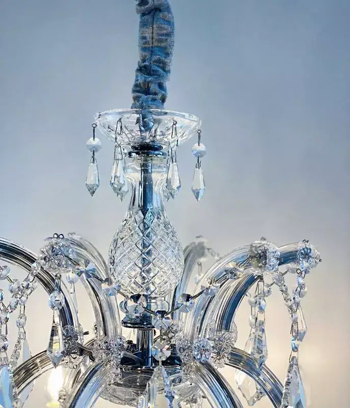 Elegant Kristall Kronleuchter Mozart with 12 crystal-covered arms, intricate glass details, and sparkling lead crystals, 80cm diameter.