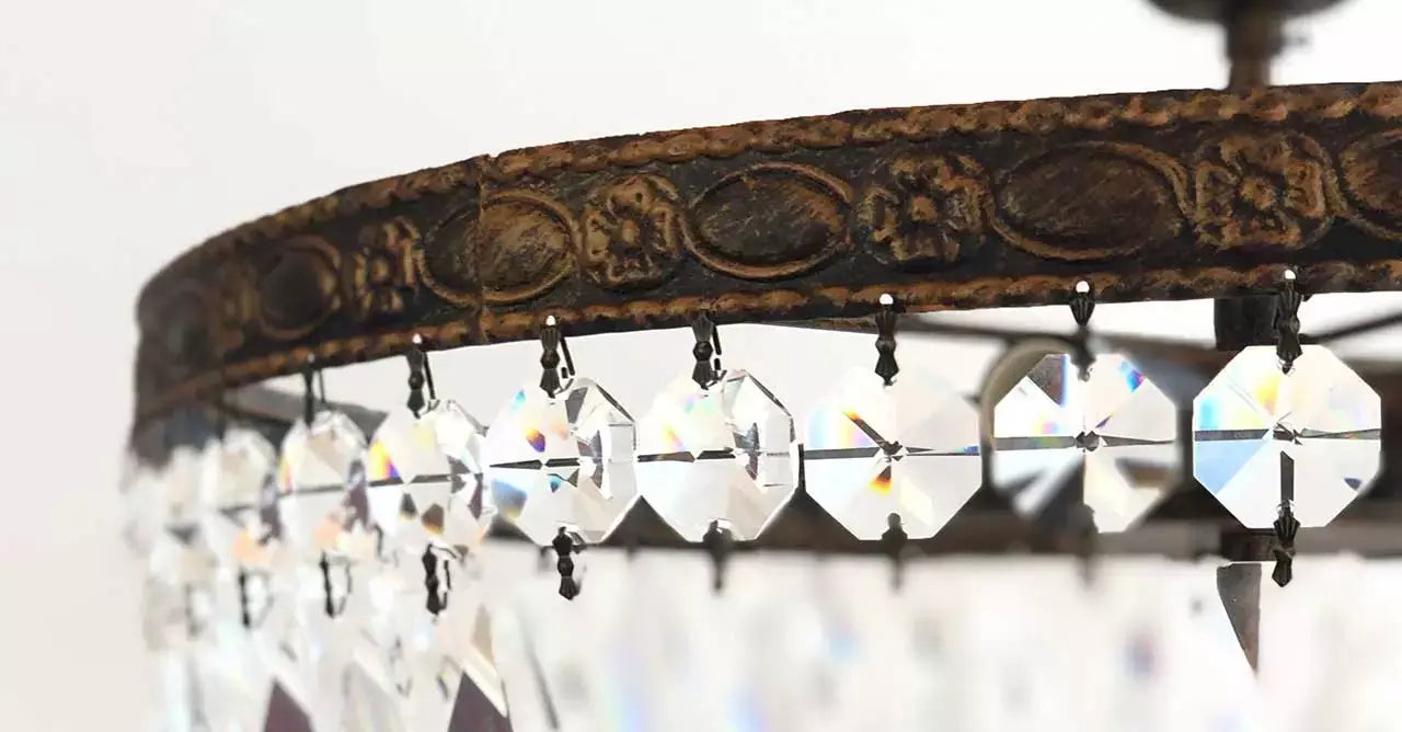 Close-up of antique gold metal and crystal detailing on the Florence ceiling lamp, showcasing its intricate design and sparkling crystals.