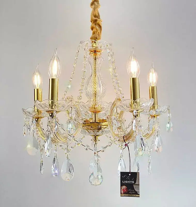 Gold crystal chandelier Ø48cm with 5 lights, brass and glass arms, shimmering cut lead crystals, dimmable, elegant home decor fixture