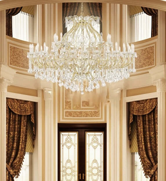 Gold crystal chandelier with 54 lights, 182cm diameter, in opulent interior setting. Adjustable height with sparkling crystals.