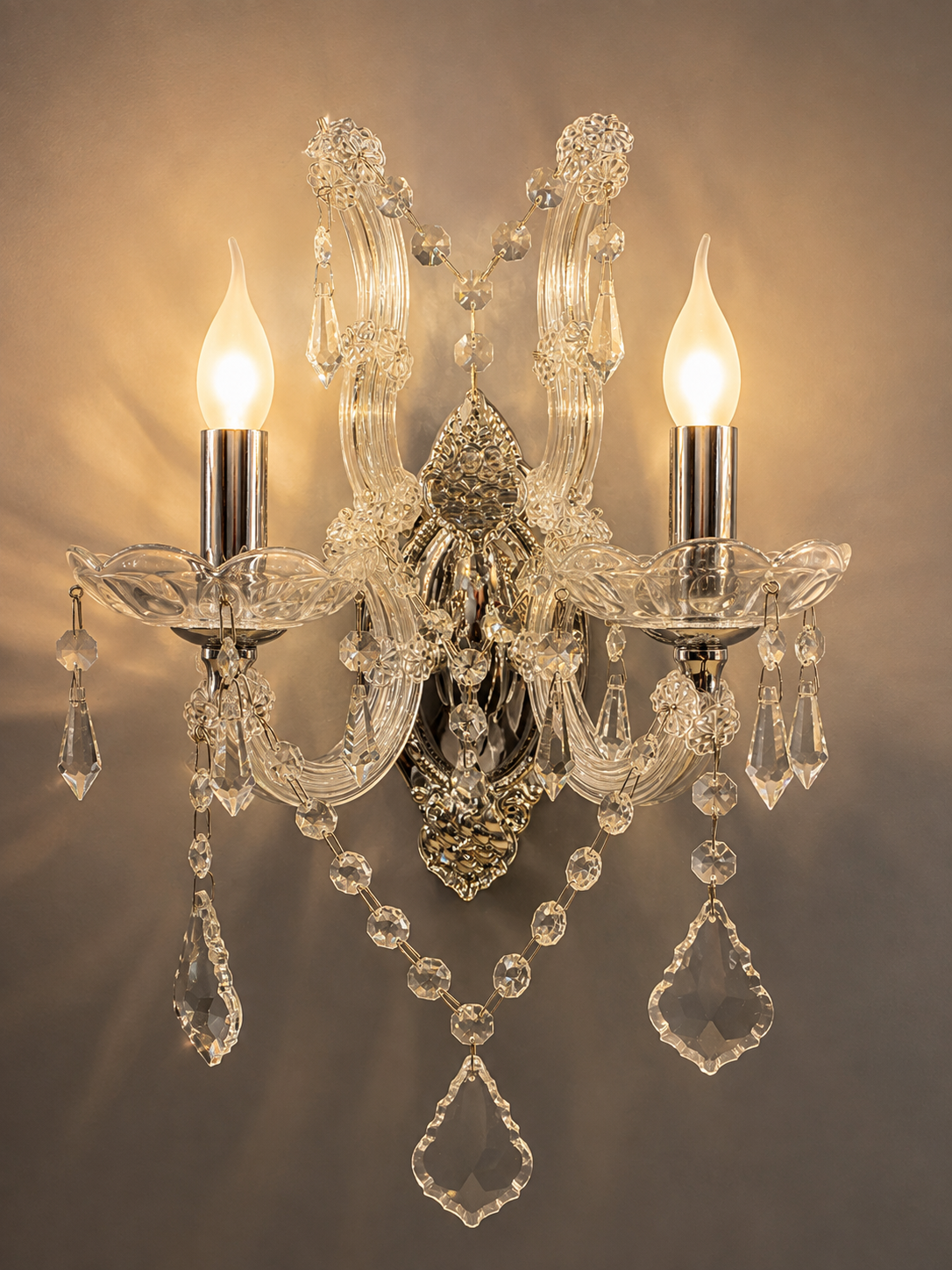 Wall light 2-flame with sparkling lead crystals in gold or silver